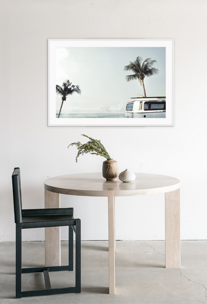 Landscape photography print with blue tones, palm trees combi van and cloudy sky 