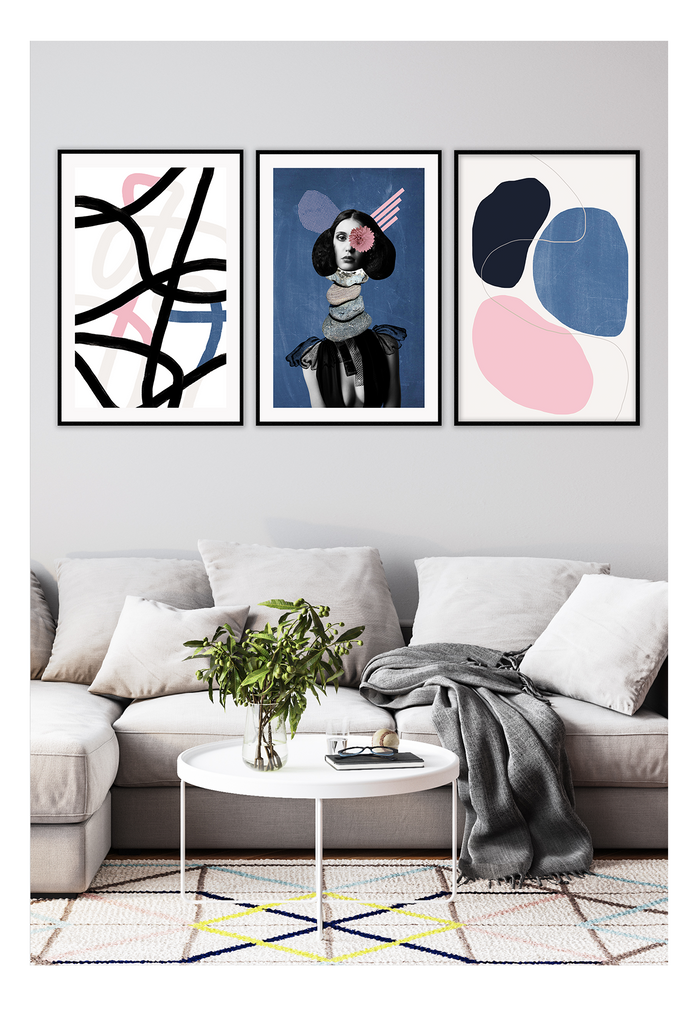Abstract art print with black pink and blue circles connected with a small grey line on a cream background 