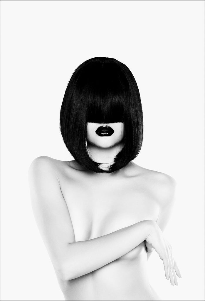 A black and white fashion wall art with a nude women figure with black straight hair.