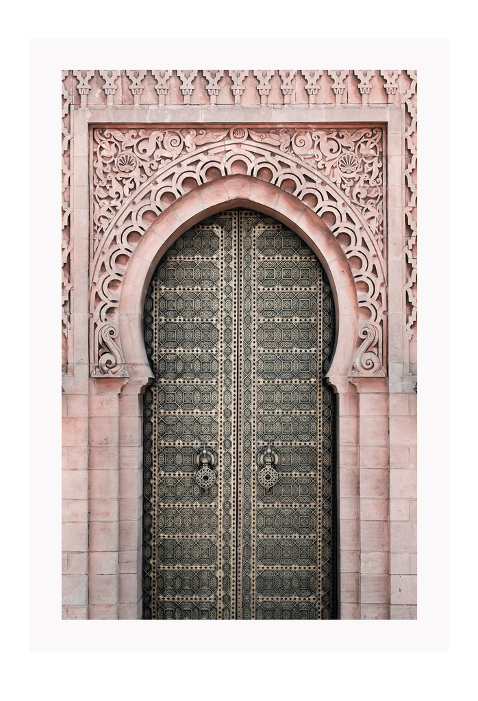 A classic morrocan architecture wall art with a pink door front and great relief carving details.
