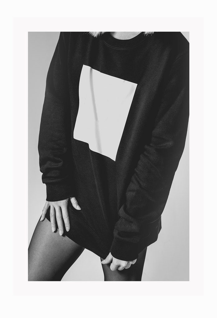 A black and white fashion wall art of a sexy lady wearing jumper and leggings.