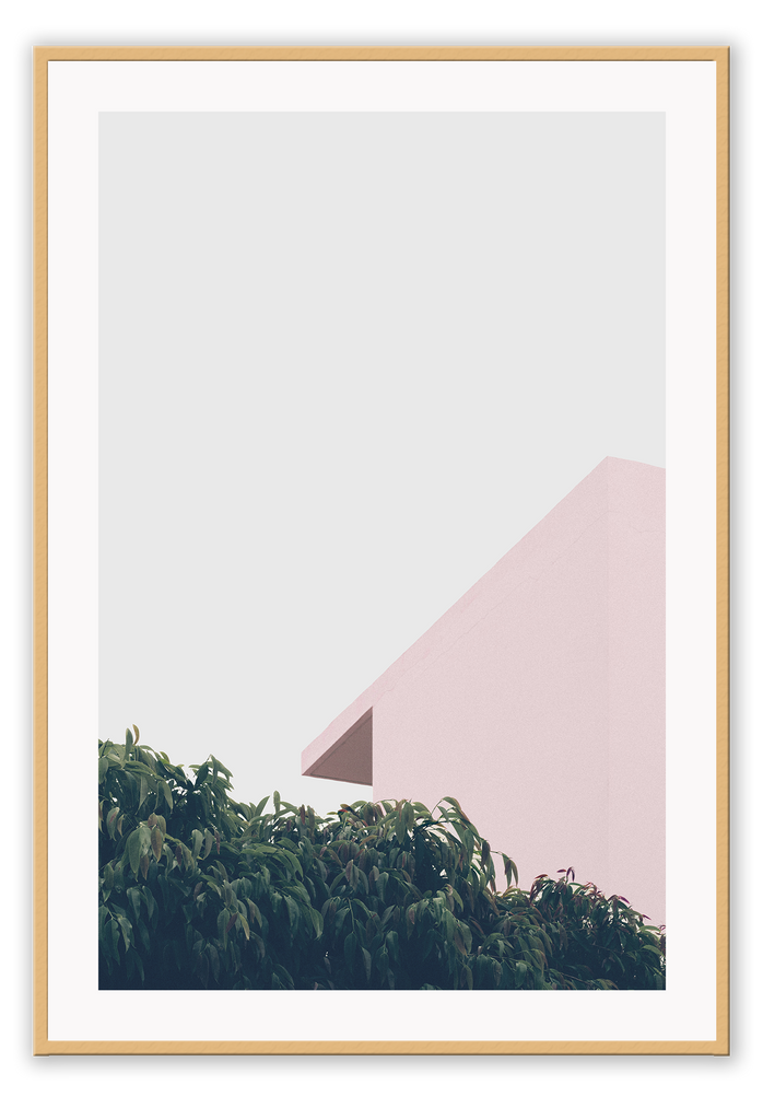 A minimal photography print peaceful wall art with pink roof, green trees and light blue sky, pastel tones.