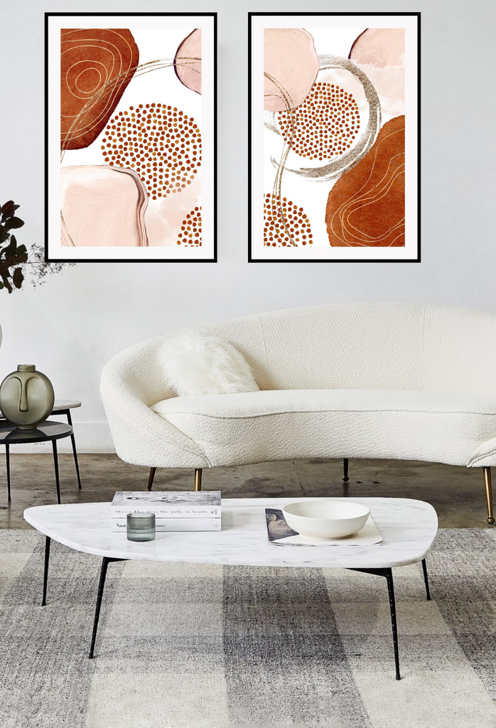 Abstract art print featuring peach and rust watercolour shapes overlapping connected with gold lines on a white background.