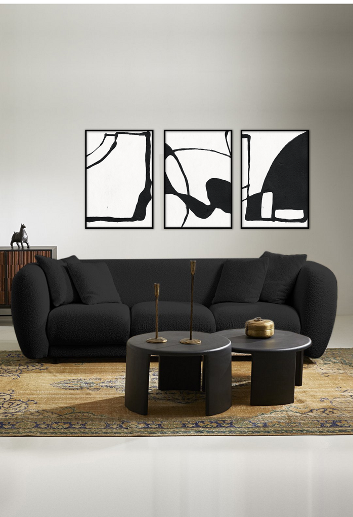 Minimalistic abstract style print with black lines on the outside complemented by a large black shape on a white background