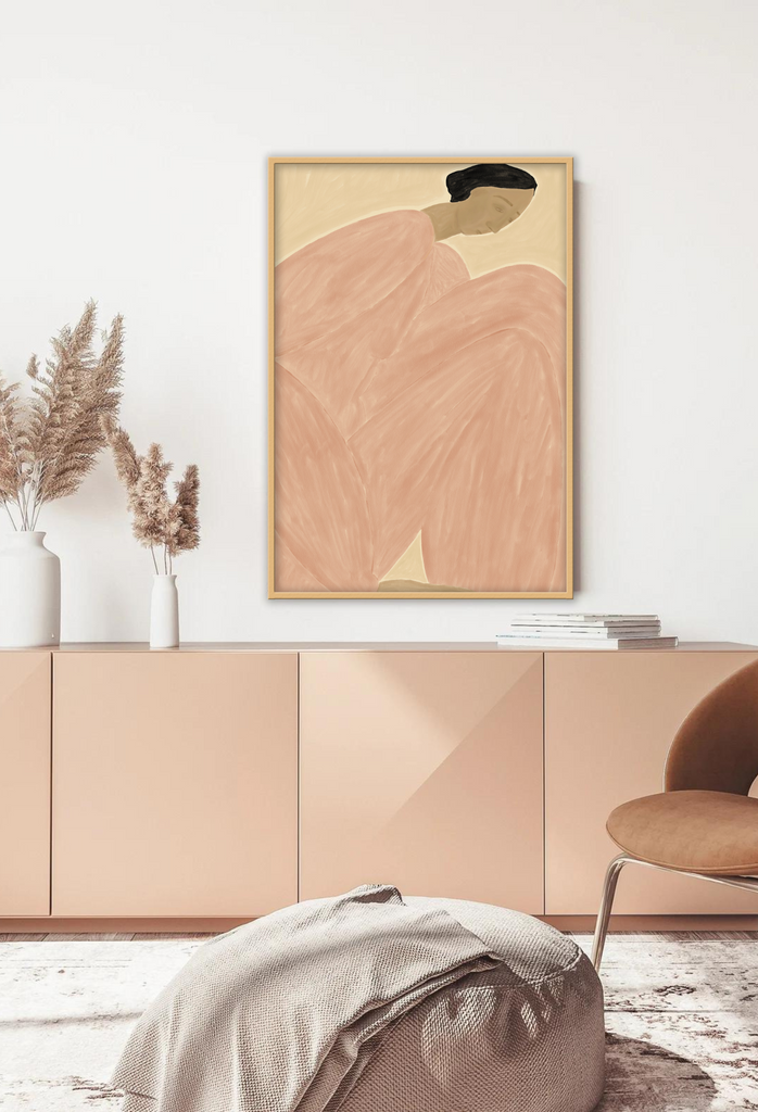 Textured art print with surrealistic shape of a person in a wide blush outfit sitting in the center on a beige background