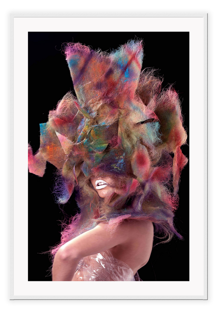 A fashion wall art with a sexy fashion model in colourful translucent plastic dress with wild bright hair. 