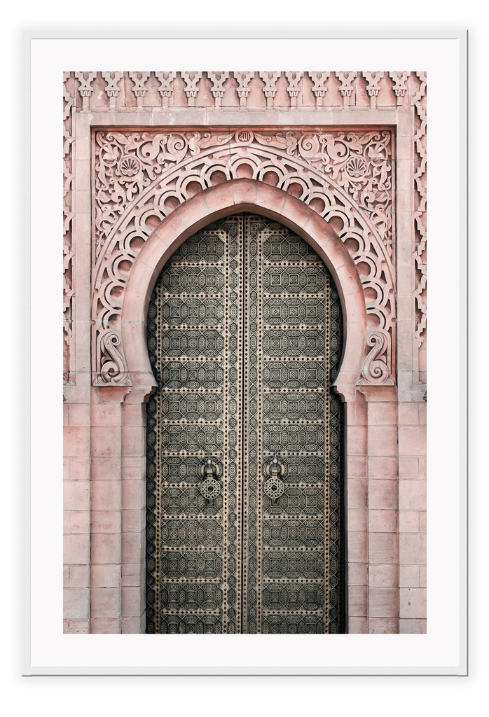 A classic morrocan architecture wall art with a pink door front and great relief carving details.