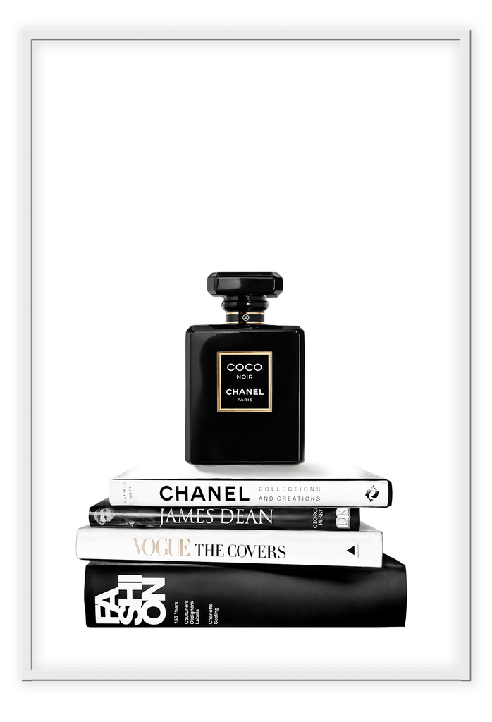 portrait print with black and white books and chanel perfume bottle on the top 