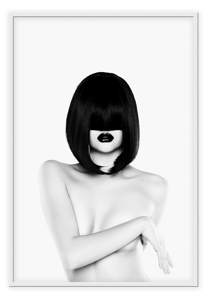 A black and white fashion wall art with a nude women figure with black straight hair.