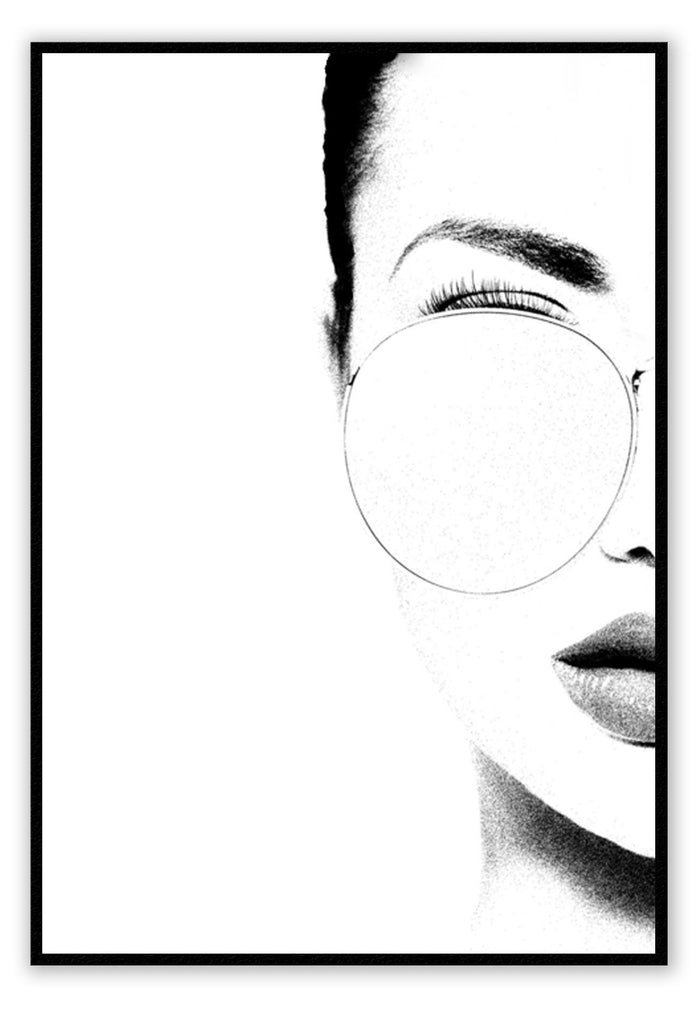 Portrait of the right side of a girl with glasses on in black and white