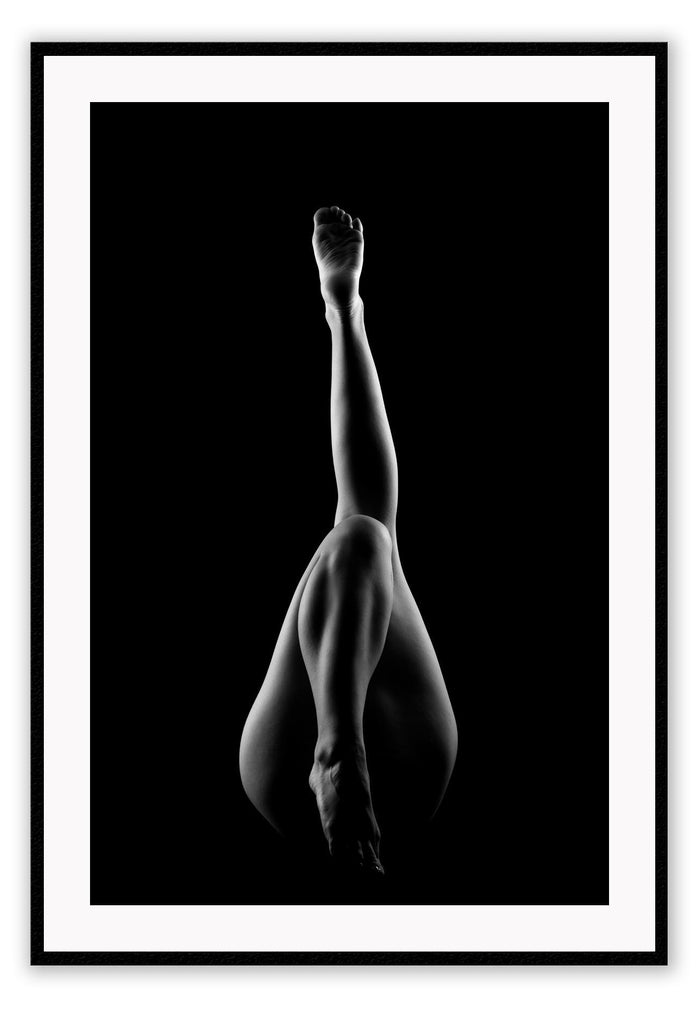 A black and white fashion wall art with dancing legs of a ballerina