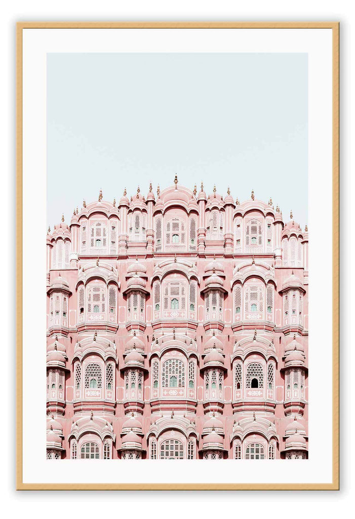 An urban wall art with pink indian architecture masterpiece. 