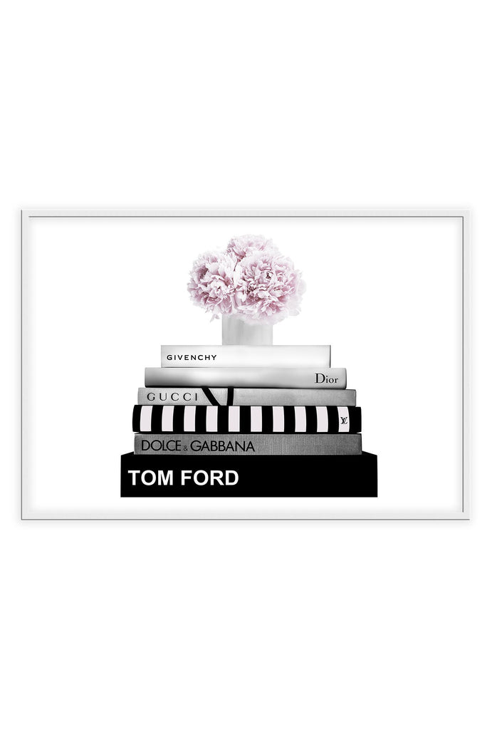Fashion print black and white fashion books stacked pink  flowers on top givenchy gucci tom ford dolce dior 