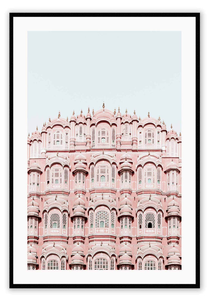 An urban wall art with pink indian architecture masterpiece. 