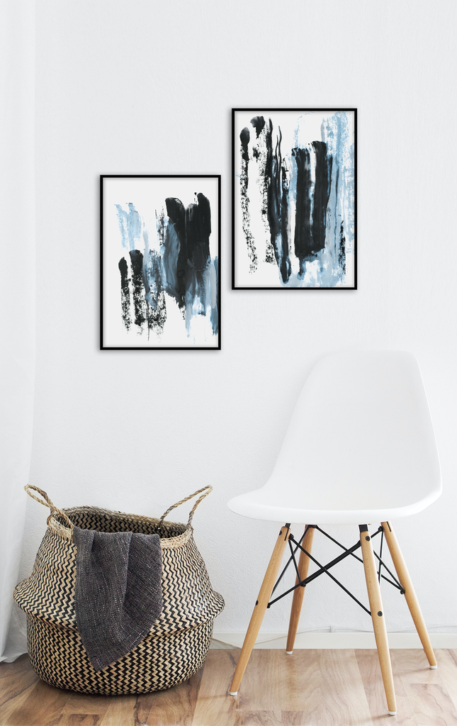 Modern abstract art print with vertical brushstrokes in black and blue tones on a plain white background.