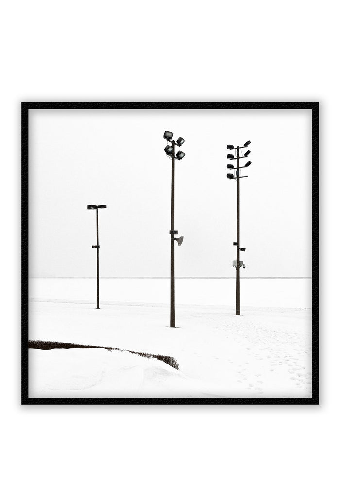 Minimal winter print with white background and black street lights.