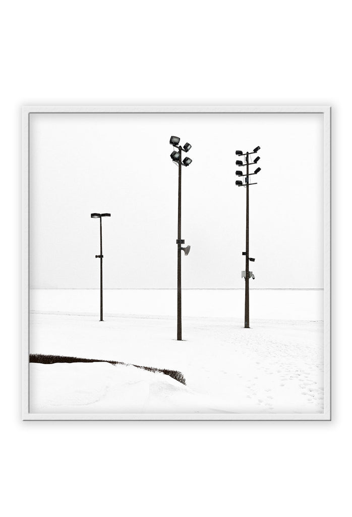 Minimal winter print with white background and black street lights.