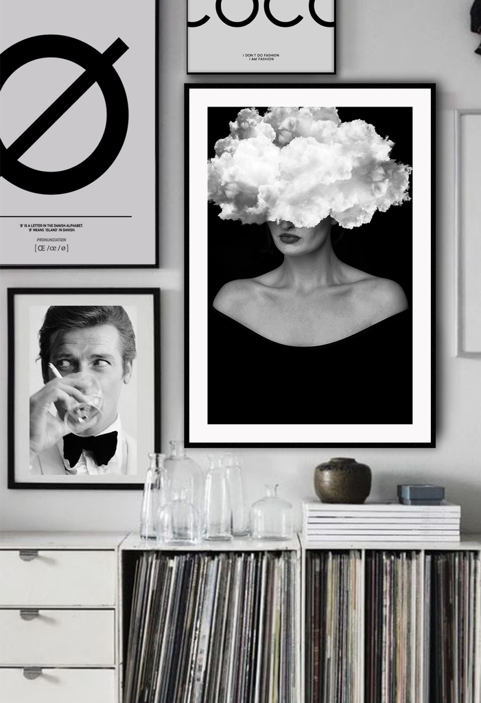 A fashion black and white wall art with a cloud on a lady's face with