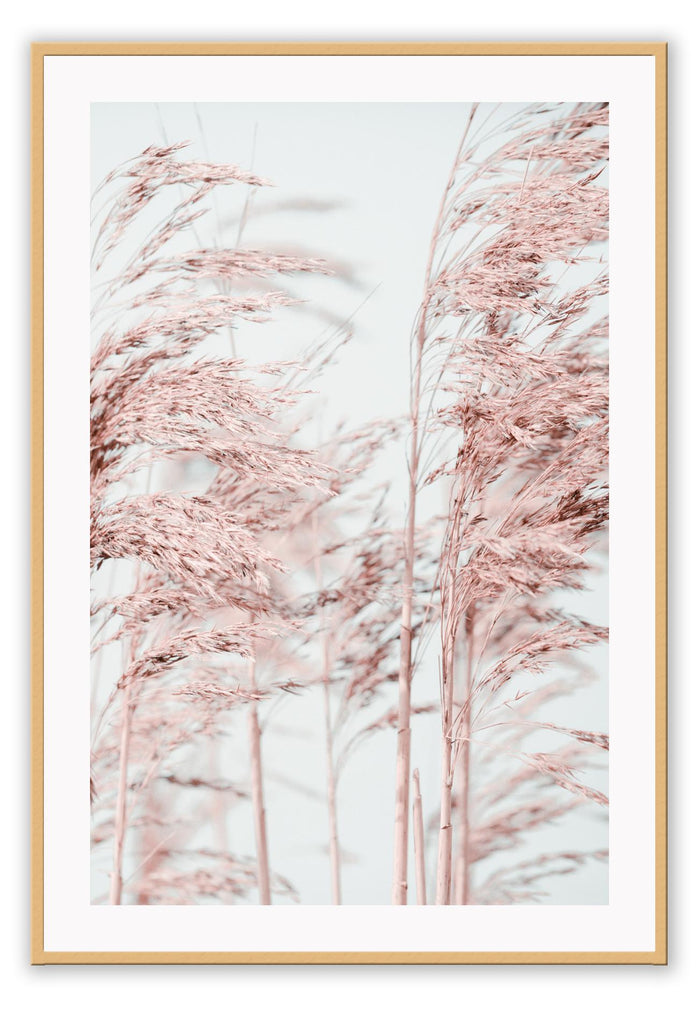 Natural minimal print with pink trees in blowing in wind and blue sky in background boho pastel style 
