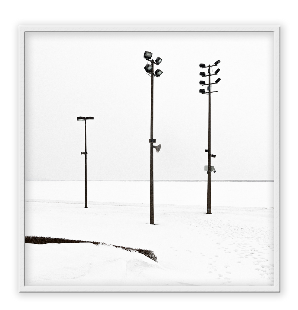 Minimal winter print with white background and black street lights.