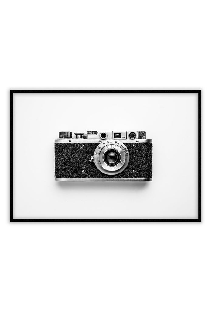 Landscape print of black and white vintage camera on grey background minimal style 