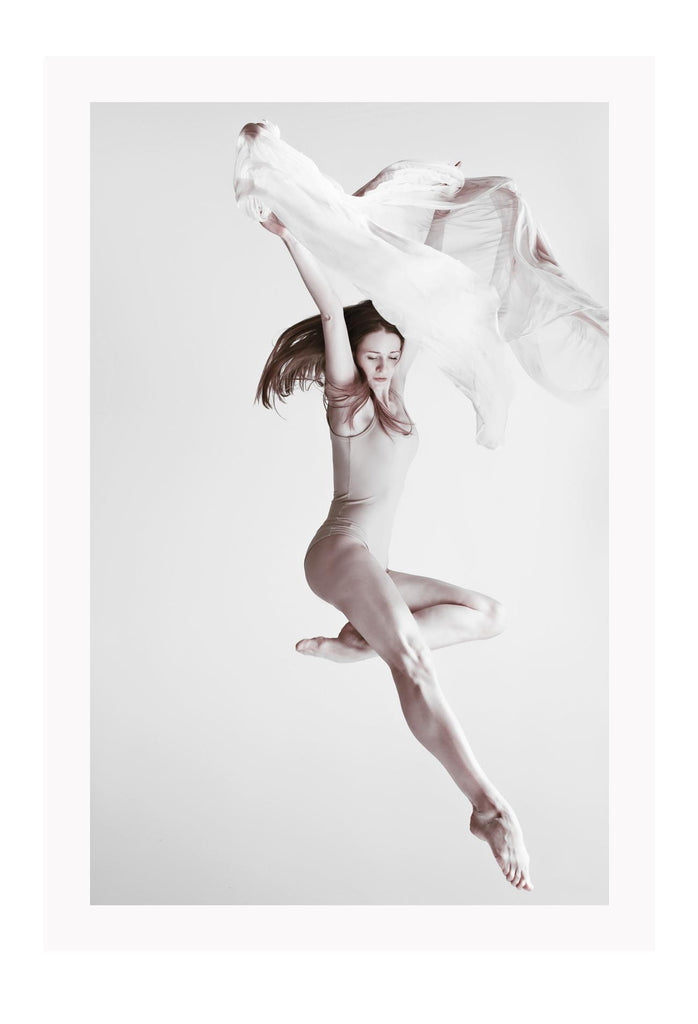 Neutral dancer woman lady jumping in air with white cloth on grey background legs point minimal print 