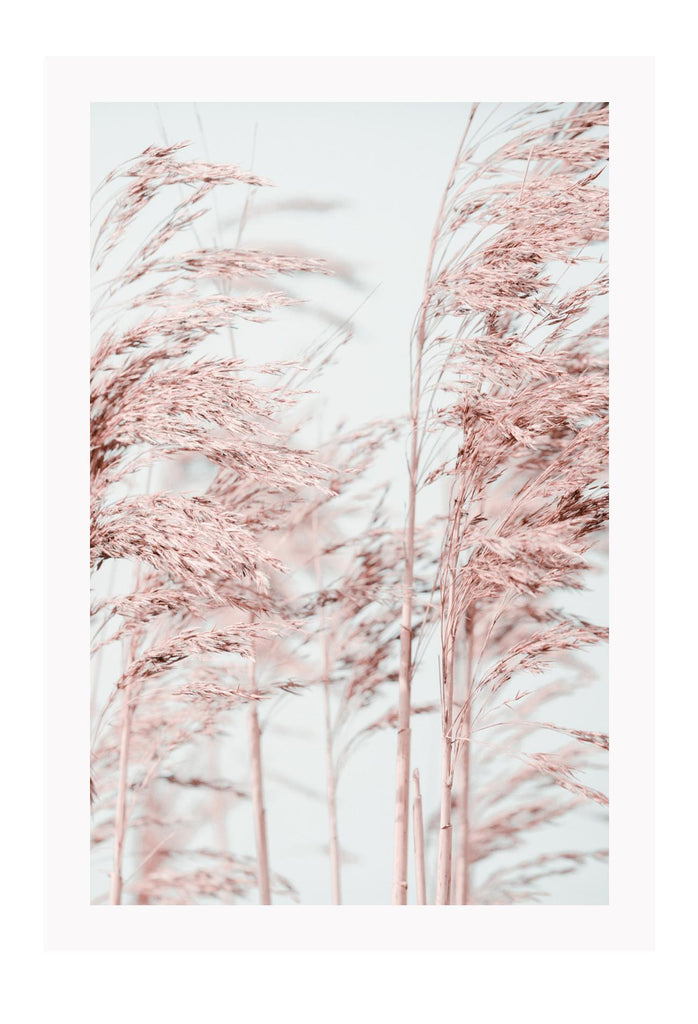 Natural minimal print with pink trees in blowing in wind and blue sky in background boho pastel style 