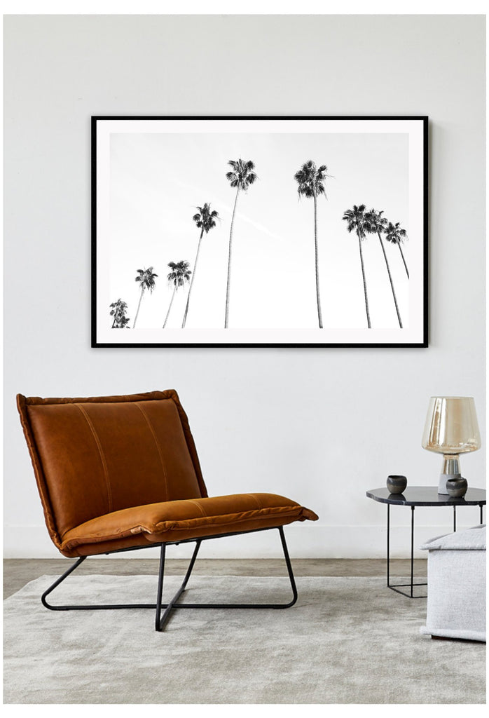 white sky black palm trees framed art print  