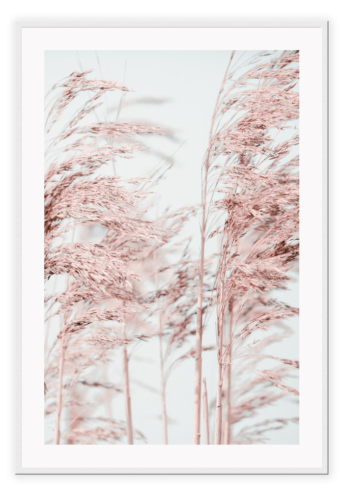 Natural minimal print with pink trees in blowing in wind and blue sky in background boho pastel style 