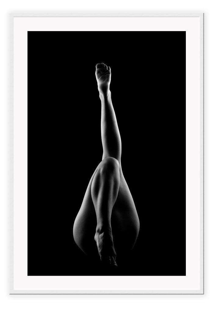 A black and white fashion wall art with dancing legs of a ballerina