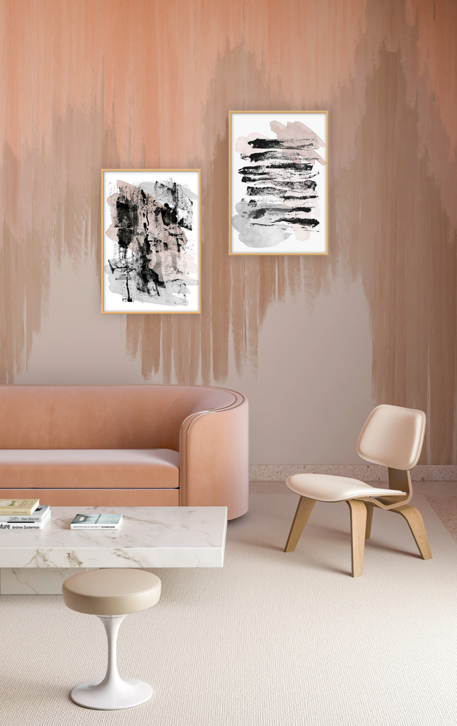 Minimal abstract print with black brushstrokes and lines on white background with pink and neutral tones 